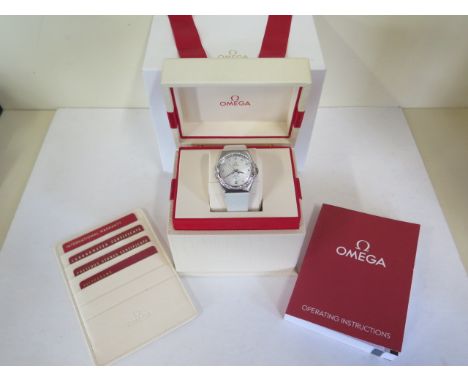 A steel Omega constellation co-axial chronometer mid size wristwatch, diamond set hour markers and date window at six o'clock