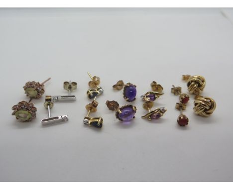 Seven pairs of 9ct earrings, most stone set including diamond, amethyst, sapphire etc, approx 7 grams 