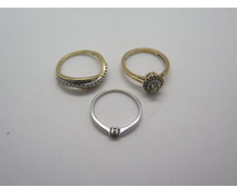 Two 9ct gold diamond set rings, sizes N 1/2, weight approx 4.7 grams, one with certificate, light usage marks, hallmarked, an