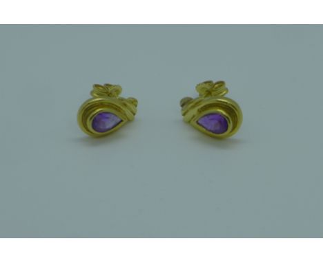 A pair of continental gold amethyst tear drop earrings, 13mm long, tests to approx 18ct, approx 4.3 grams 