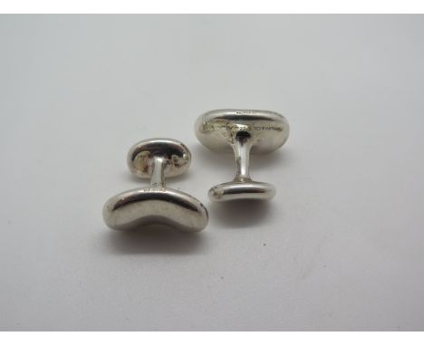 A pair of Tiffany and Co Elsa Peretti bean design cufflinks, with full hallmarks and signature, approx 27 grams, some general