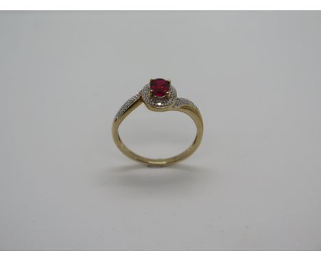 A 9ct hallmarked ruby and diamond ring, size M, approx 1.9 grams, generally good condition 
