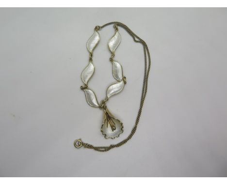 A silver gilt, white enamel Norwegian necklace of leaf and flower design, makers mark Aksel Holmsen, approx 10 grams, in gene