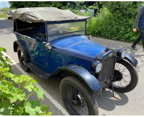 A 1927 Austin Seven Chummy Four-Seater.Reg No. UN 623Chassis No.41599Engine No. AH-8633Blue, Black Wings, Black interior.Cons