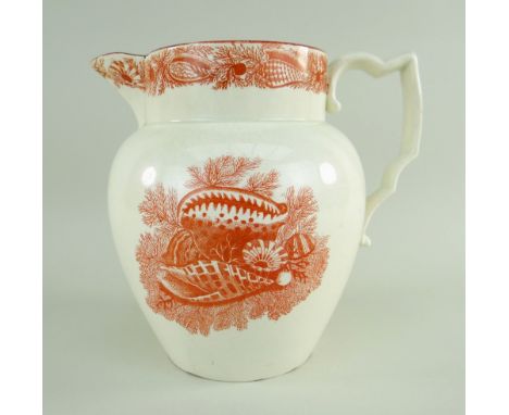 A SWANSEA CAMBRIAN POTTERY JUG WITH MARINE LIFE TRANSFER of ovoid form with scroll handle, printed in red with scenes of seaw