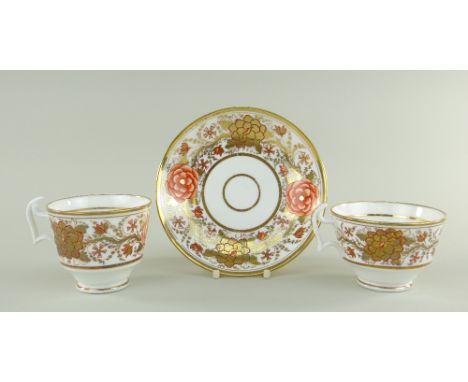 A SWANSEA PORCELAIN JAPAN PATTERN TRIO the two cups with curvaceous ogee handles, decorated with a wide border of alternating