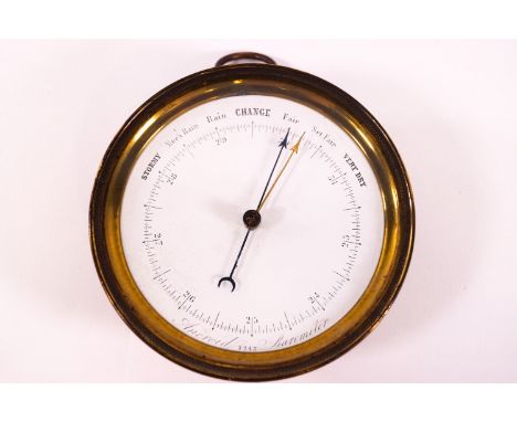 A 19th century brass aneroid barometer with hanging loop, no maker's name, 12.3cm diameter