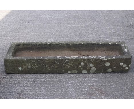 A rectangular stone shallow trough, 131cm x 38cm