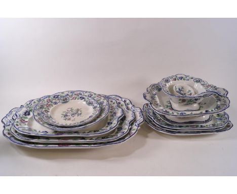 A Corona Ware 'Old Woodstock' pattern earthenware dinner service, twelve person setting, five graduated serving plates, and f