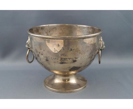 A round silver bowl, with two lion mask and ring handles, on flared foot, engraved "A-A-M 1912 1 Mile Army Championship, 3rd 