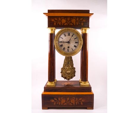 A 19th century rosewood Portico clock in the Empire style with box wood line and floral inlays, ornate brass pendulum, 51cm h
