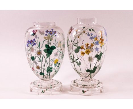 A pair of Victorian clear glass vases, painted with enamel flower decoration , 15cm high