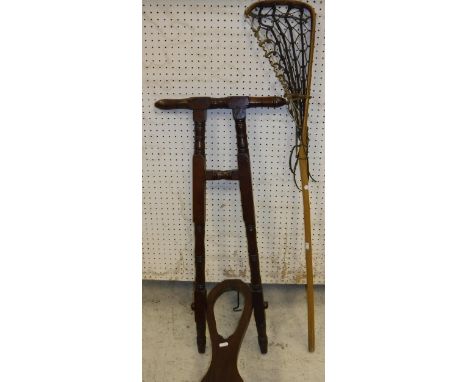 A beech folding boot jack, together with a lacrosse stick stamped "Hattersley Varsity Special" and two pairs of ice skates 