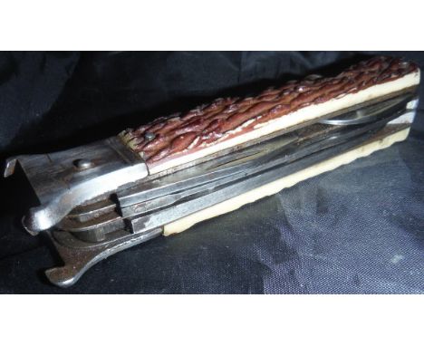 A sportsman's pocket knife with seven gadgets  CONDITION REPORTS Maker's name Mikov (of the Czech Republic / Czechoslovakia).