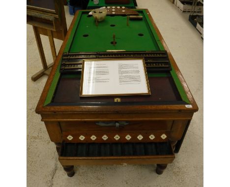 An early 20th Century mahogany bar billiards table by W J & S Limited (William Jelks & Son) and scoreboard and cue, etc CONDI