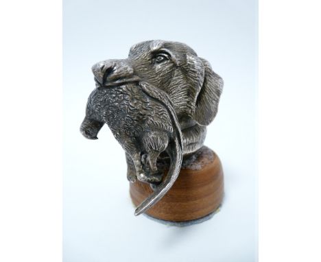 VINTAGE CAR ACCESSORY MASCOT - GUN DOG HEAD WITH GAME possibly by East London Rubber Co Ltd, circa 1920s, 7.25cms H.