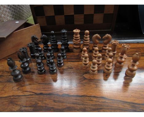 A Calvert wooden chess set with turned and carved pieces, the white castles with "Calvert 189 Fleet Street" to bases, King 10