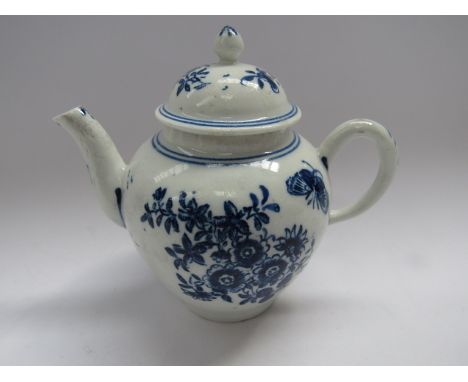 A Lowestoft porcelain blue and white miniature teapot and lid print-decorated with butterflies and sprays of flowers. 10cm ta