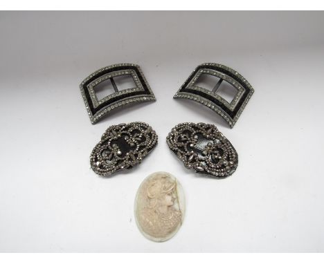 A pair of paste-set shoe buckles, another pair set with marcasite and a ceramic cameo a/f 