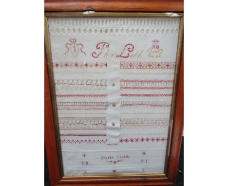 A late Victorian needlewoman's sampler, the white cotton panel entitled "Thi Lith" and demonstrating various smocking pattern