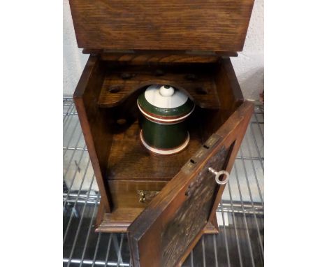 Art Nouveau smoker's cupboard with key, containing tobacco jar