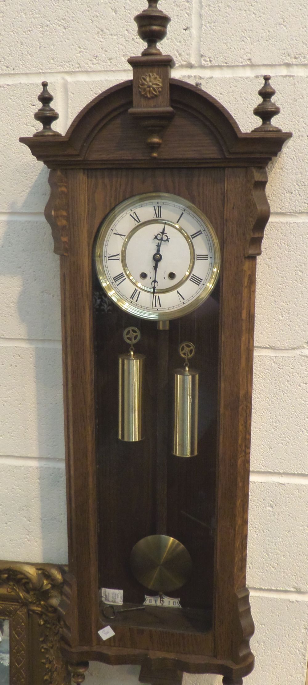 Vienna chiming mahogany cased wall clock with twin weights, pendulum