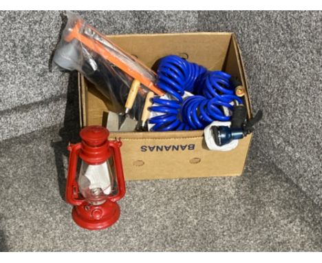 Large garden hose, lantern and trowels