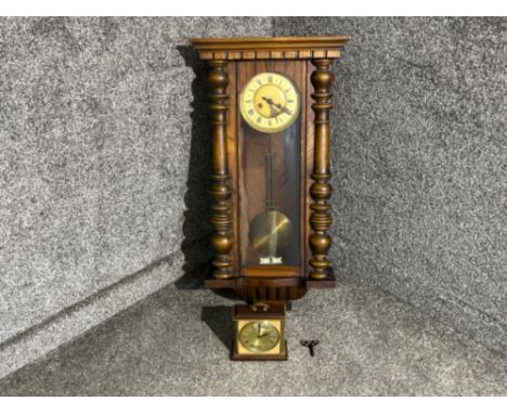 Large wall clock with pendulum and key working , also decorative mantle clock