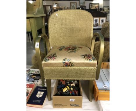 A 1950's loom commode chair