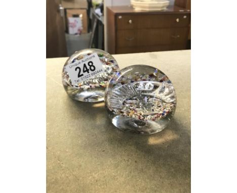 2 paperweights encapsulating military badges, City of London Yeomanry (rough rider) shoulder badge and Army Service Corps Cap