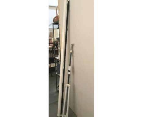 A large projector screen and stand