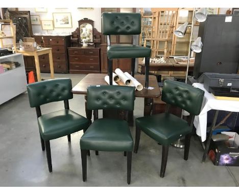 A set of 4 green vinyl covered chairs with deep button backs and an Edwardian oak drop leaf table