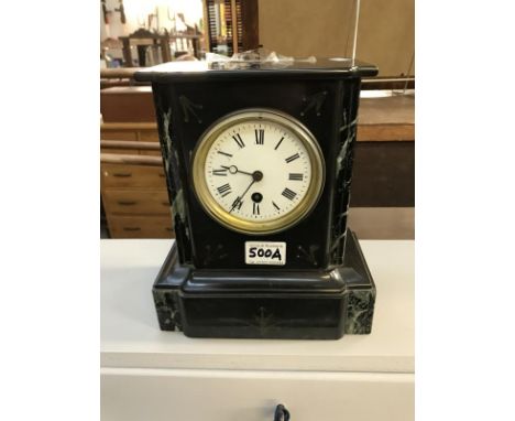 A marble mantle clock (working &amp; with key)