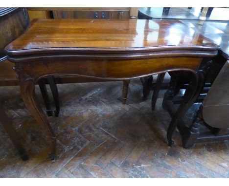 Victorian rosewood serpentine fold top card table on cabriole legs