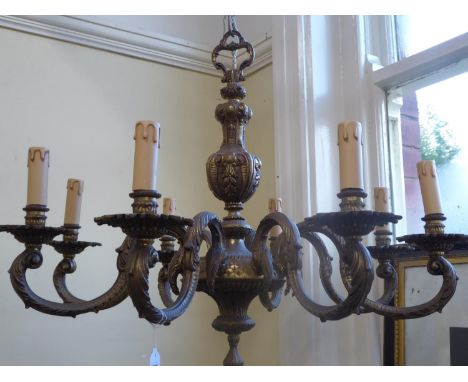 Early 20thC heavy brass 8 branch light fitting