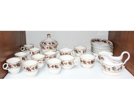 SECTION 13. A late 18th/ early 19th century 22-piece Flight and Barr Worcester part tea and coffee service in the 'Brown Grap