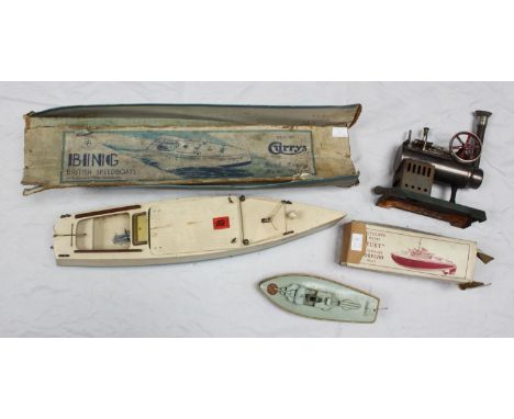 A Sutcliffe Model 'Fury' tinplate clockwork Torpedo Boat, painted in red and grey with gold edging, lacking key, approx. 24cm