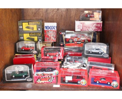 SECTION 33. A collection of approximately 20 boxed die-cast models of Alfa Romeo cars including an M4 model of an 8C Spider, 