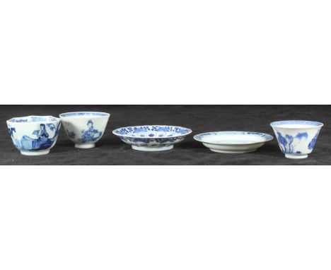 A Chinese Kangxi period blue and white porcelain tea bowl and matched saucer, painted in the 'Jumping Boy' pattern, c1700, to