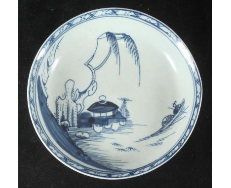 A Richard Chaffers Liverpool porcelain saucer, c.1758-60, painted with a low Chinese hut beneath willow issuing from rockwork