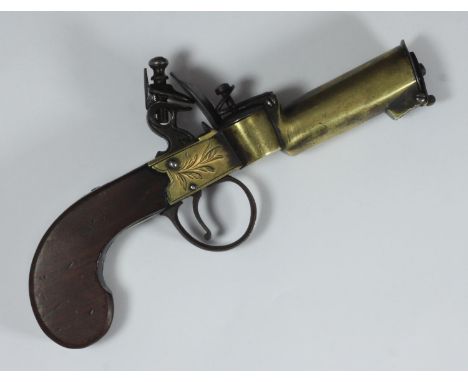 An early 19th century brass flintlock tinder lighter, with stained wooden stock and ornate, foliate decoration to lock, lacki