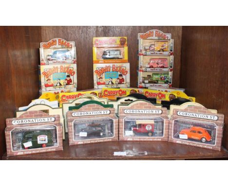 SECTION 53. A collection of approximately 30 boxed die-cast model vehicles, predominantly by Lledo, comprising 'Coronation St