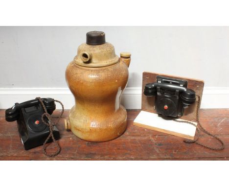 Two various Bakelite telephones, one by ATM (AF) together with 'The Griffin' ceramic gas generator by Griffin &amp; George Lt