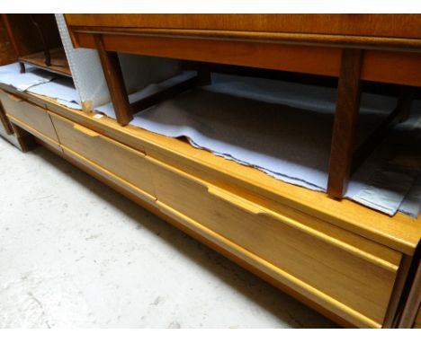 A Portwood (G-Plan-style) three-drawer side table