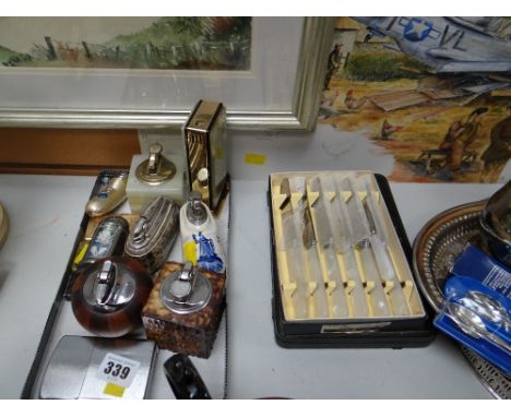 A collection of vintage cigarette lighters