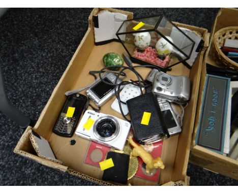 Digital cameras, vintage mobile phones, Chinese cased eggs etc