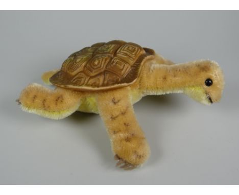 A STEIFF SOFT-TOY TORTOISE with plastic shell and glass eyes, stud marked Steiff (BBC Bargain Hunt)