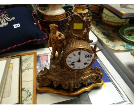 A reproduction gilt French-style mantel clock