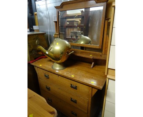 A vintage three-drawer mirror back dressing table