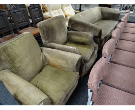 A vintage green corduroy lounge-suite comprising club-style three seater sofa, two armchairs